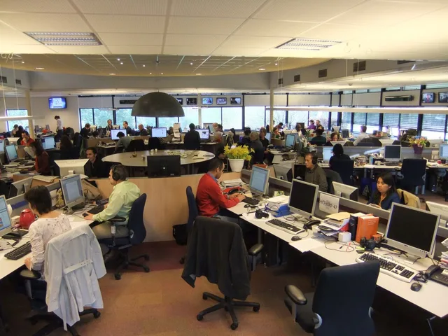 RNW's newsroom - with the big central desk. Press release distribution: Manchester, Leeds and Birmingham
